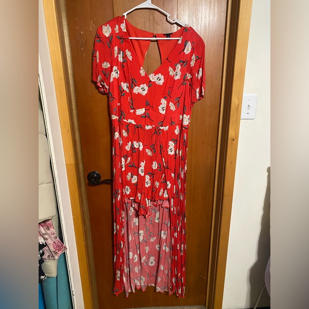 Red/pink colored high low romper from torrid
